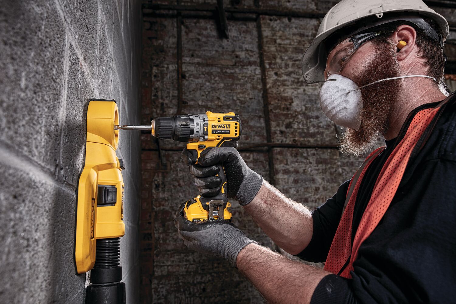 Brushless cordless hammer drill with battery is being used by a person to drill.